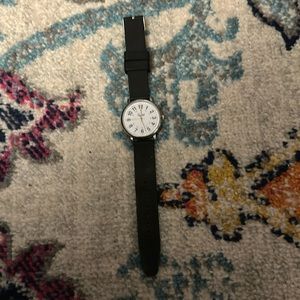 Speidel // anaolog watch silver detailing with black adjustable silicone strap